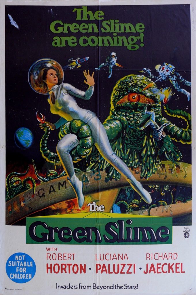 The Green Slime (1968) movie poster featuring astronauts in silver suits battling a tentacled green monster against a cosmic background.